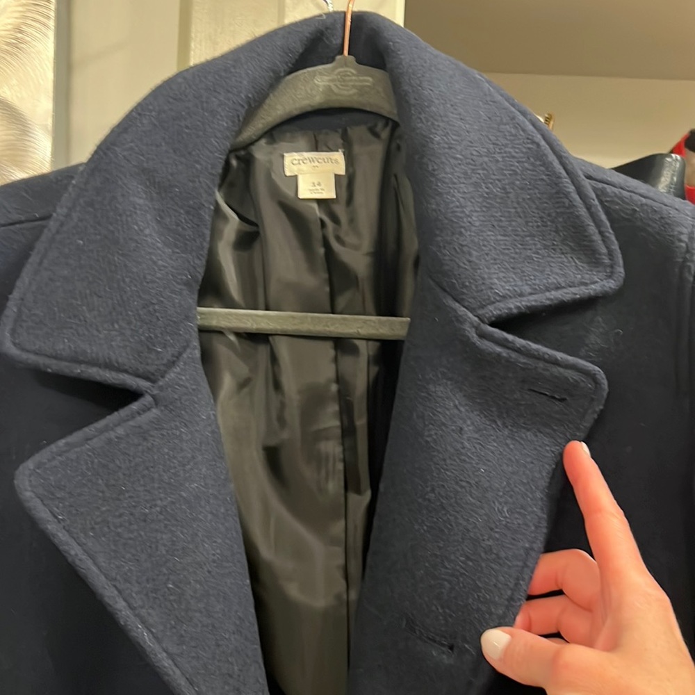 Like new. It’s a blue Ludlow J.Crew size 14 navy boys peacoat